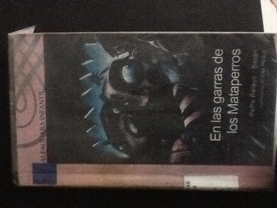 En las garras de los mataperros cover
