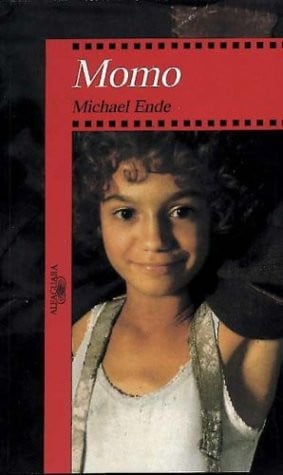 Momo o la extraña historia de los ladrones del tiempo y de la niña que devolvió el tiempo a los hombres una novela-cuento de hadas cover